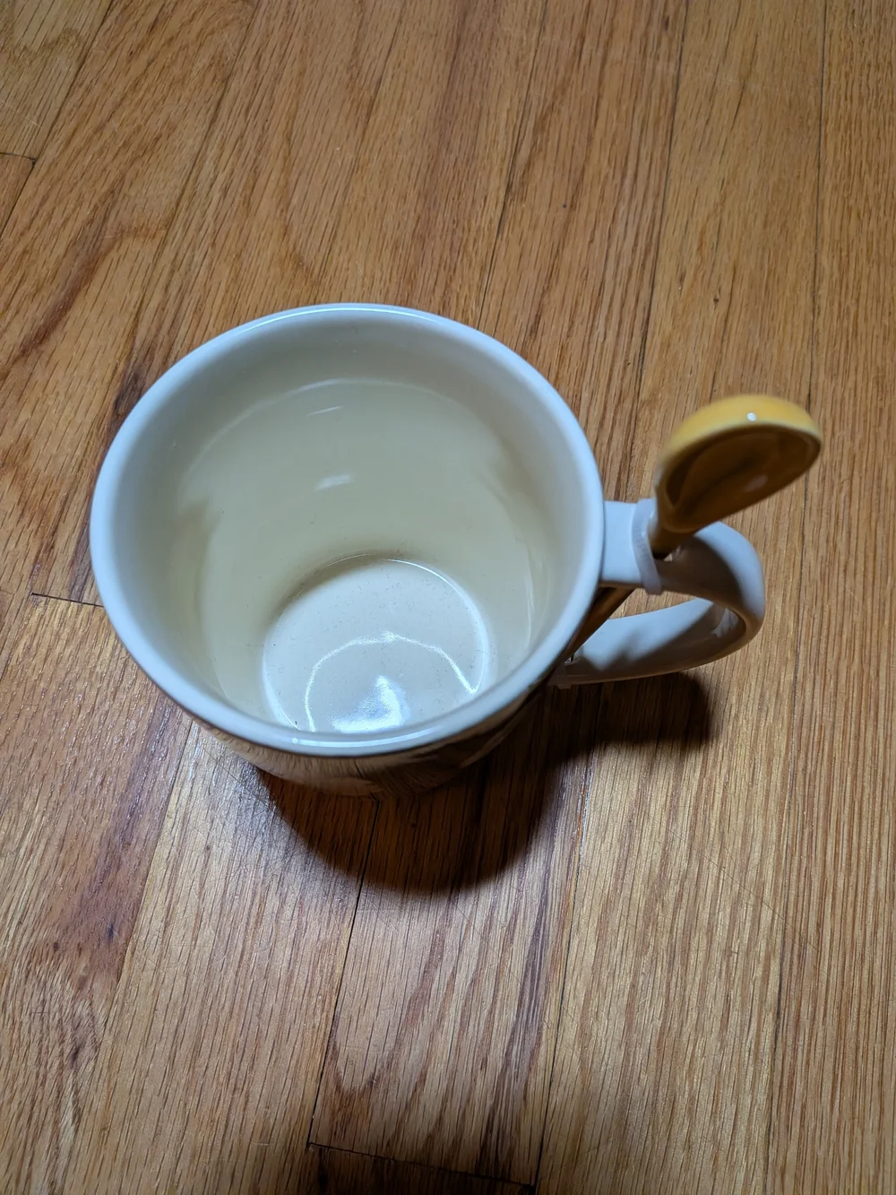 Tabitha Black Floral Ceramic Mug with Yellow Stirring Spoon